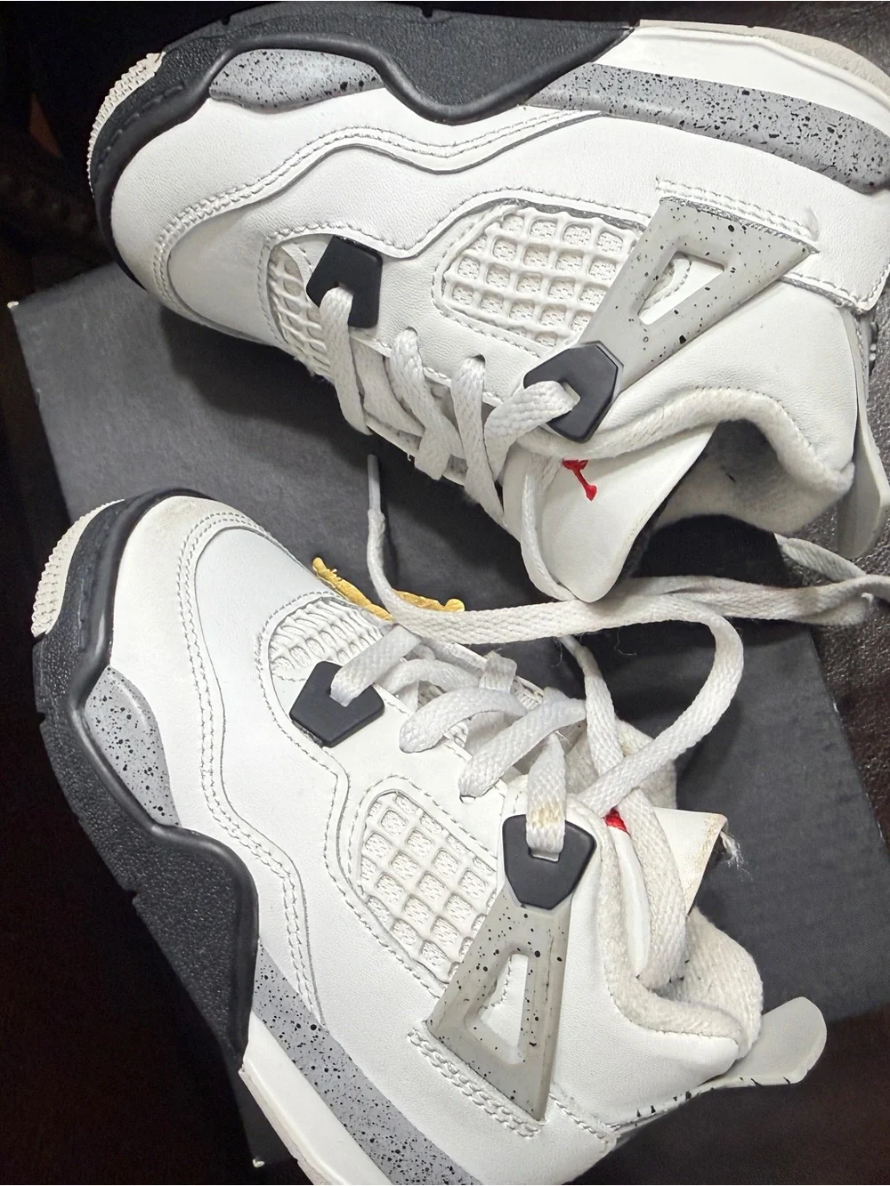 Nike Kids White Sneakers with Black Soles and Red Jumpman